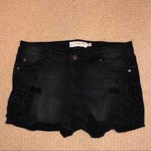 Torrid black laced cornered jean shorts